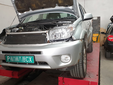 Toyota Rav 4 on temporary import plates has headlights changed Toyota Rav4 on ramp